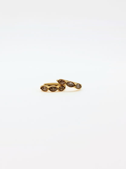 The Asteria 18k Gold Plated Salt & Pepper Crystal Evil Eye Huggie Hoop Earrings- Waterproof & Tarnish-Free