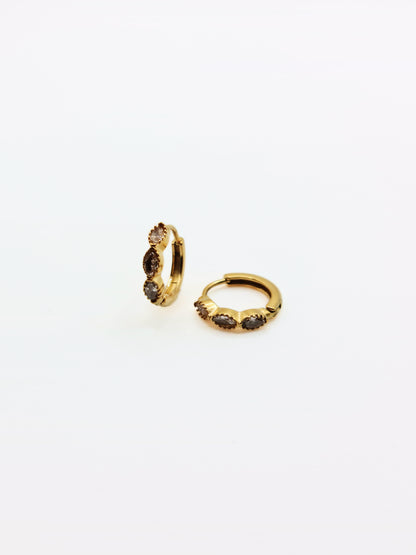 The Asteria 18k Gold Plated Salt & Pepper Crystal Evil Eye Huggie Hoop Earrings- Waterproof & Tarnish-Free