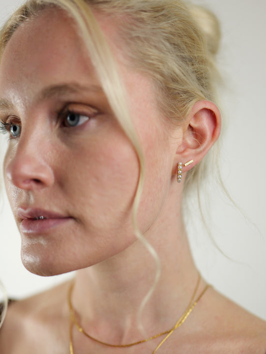 gold-pearl-huggie-hoop-earrings-stainless-steel-tarnish-free-jewellery-waterproof-ember-and-stone-1