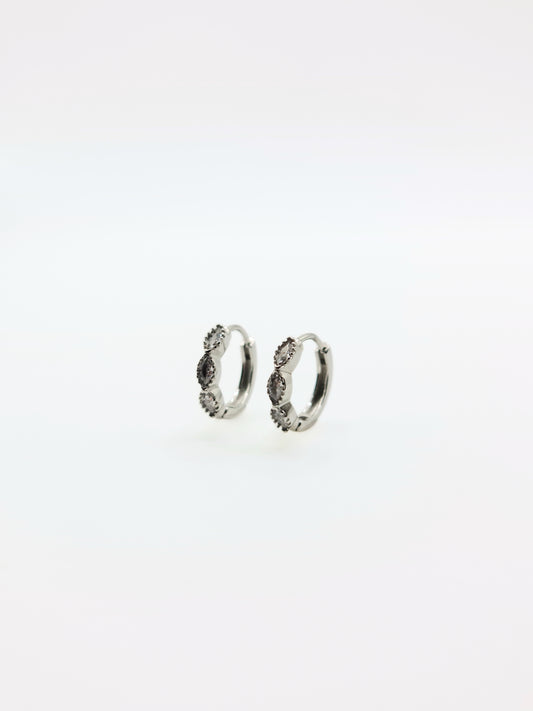 The Asteria Silver Finish Salt & Pepper Crystal Evil Eye Huggie Hoop Earrings- Waterproof & Tarnish-Free