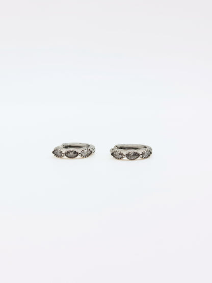 The Asteria Silver Finish Salt & Pepper Crystal Evil Eye Huggie Hoop Earrings- Waterproof & Tarnish-Free