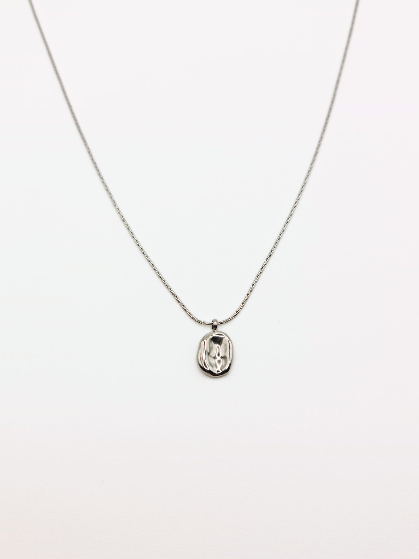 silver-organic-hammered-metal-pendant-necklace-stainless-steel-tarnish-free-jewellery-waterproof-ember-and-stone-2