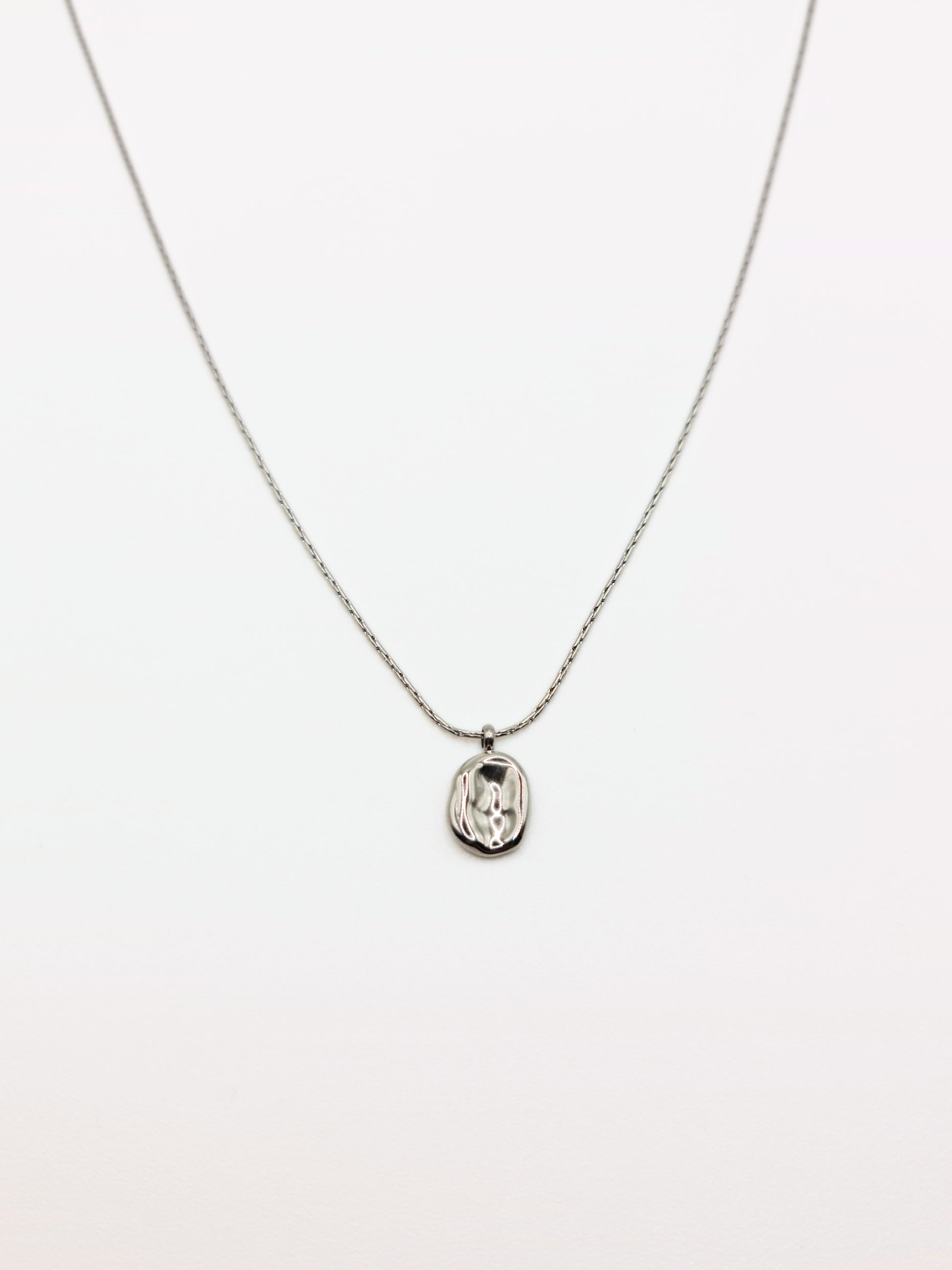 silver-organic-hammered-metal-pendant-necklace-stainless-steel-tarnish-free-jewellery-waterproof-ember-and-stone-2