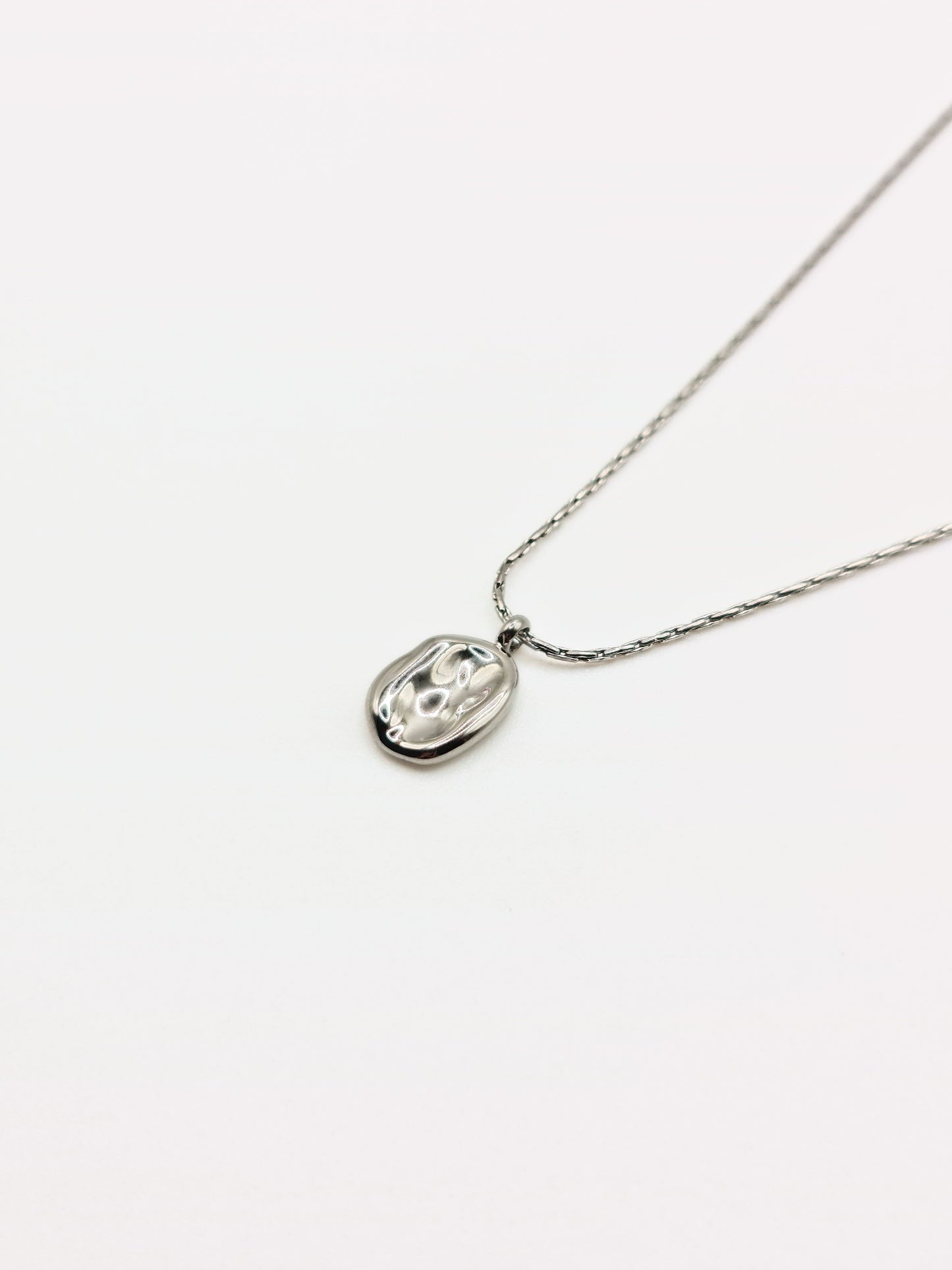silver-organic-hammered-metal-pendant-necklace-stainless-steel-tarnish-free-jewellery-waterproof-ember-and-stone-2