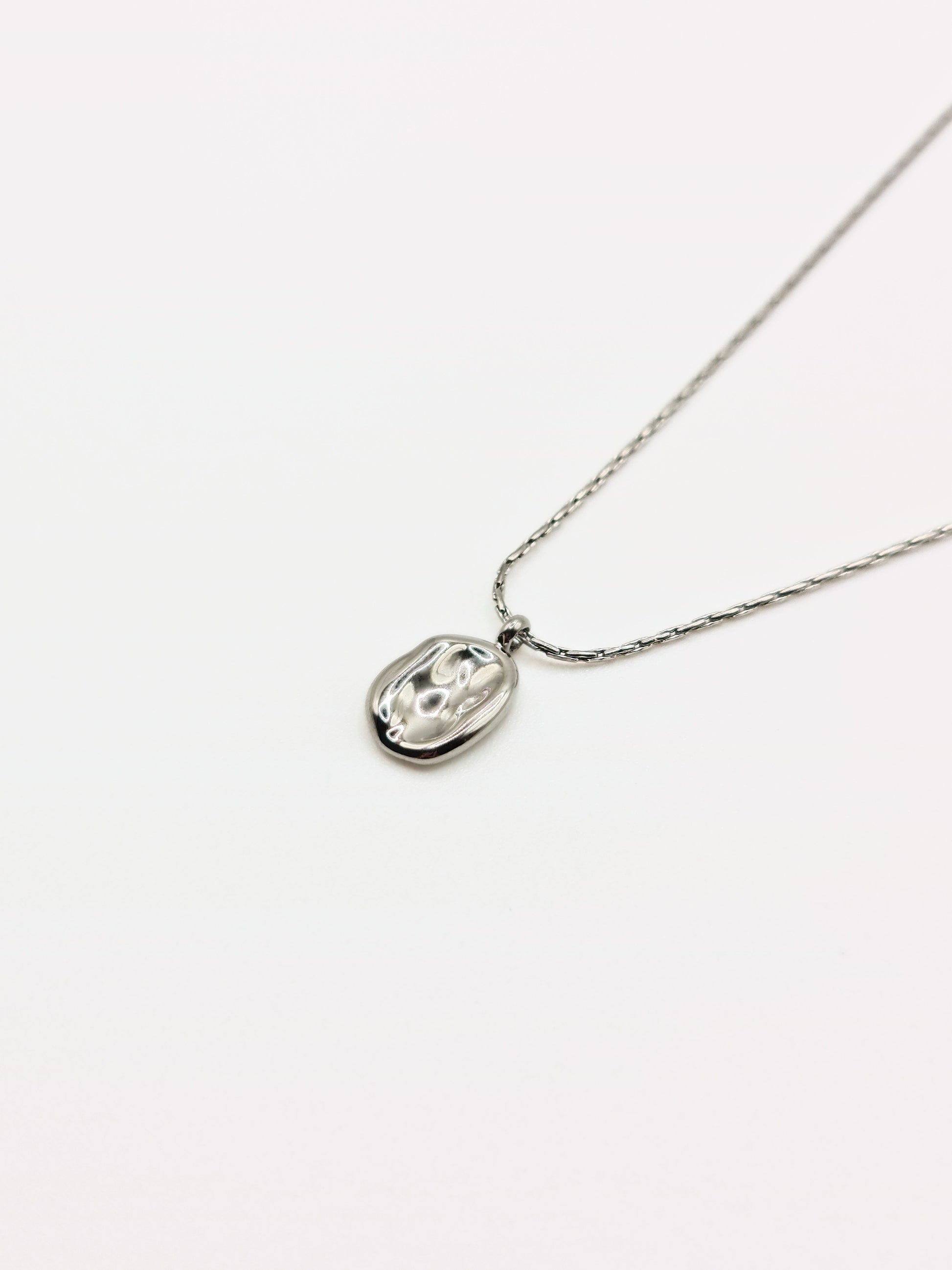 silver-organic-hammered-metal-pendant-necklace-stainless-steel-tarnish-free-jewellery-waterproof-ember-and-stone-2