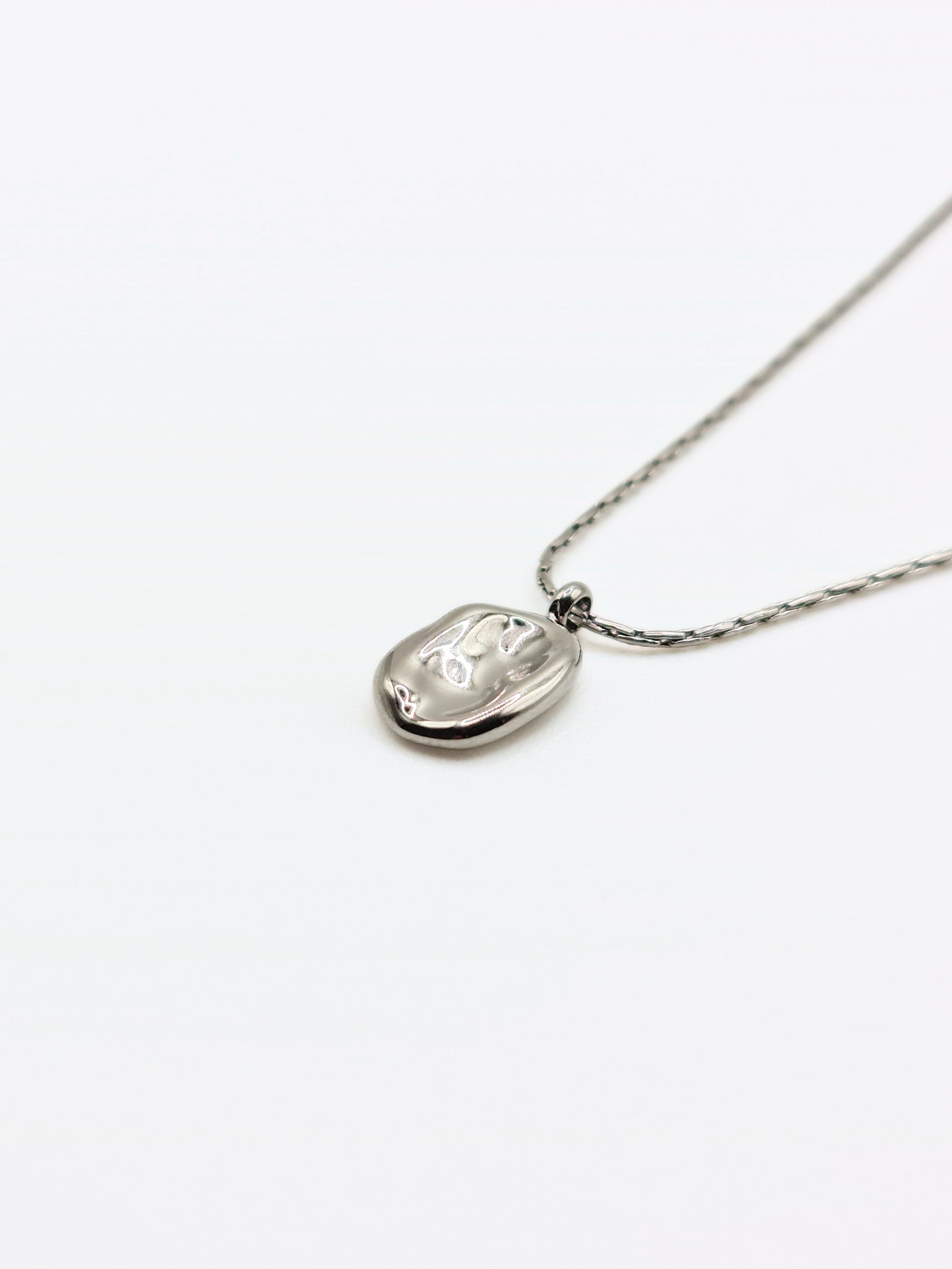 silver-organic-hammered-metal-pendant-necklace-stainless-steel-tarnish-free-jewellery-waterproof-ember-and-stone-2