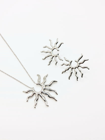 silver-sun-pendant-necklace-stud-earrings-matching-set-summer-stainless-steel-tarnish-free-jewellery-waterproof-ember-and-stone-1_f9a1e1c0-ce47-4bc7-9197-2eaf6c0348d1