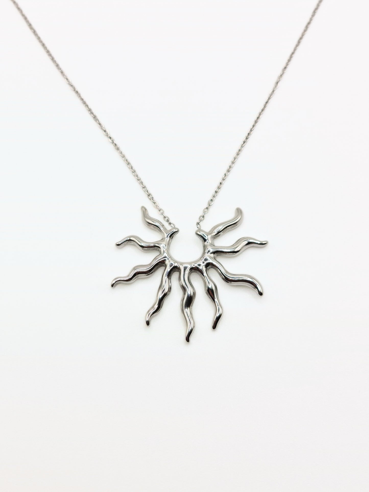 silver-sun-pendant-necklace-stud-earrings-matching-set-summer-stainless-steel-tarnish-free-jewellery-waterproof-ember-and-stone-1_f9a1e1c0-ce47-4bc7-9197-2eaf6c0348d1