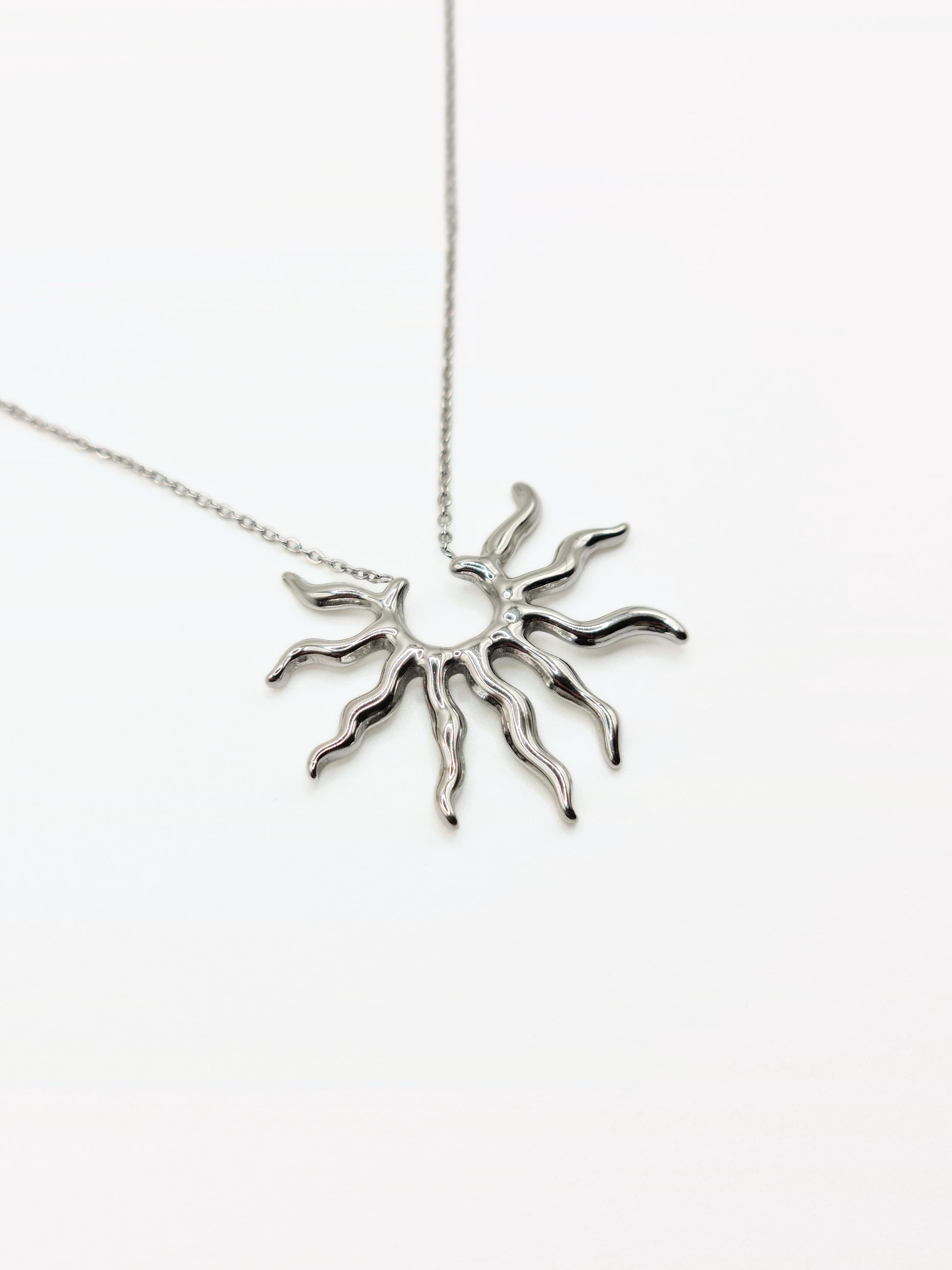 silver-sun-pendant-necklace-stud-earrings-matching-set-summer-stainless-steel-tarnish-free-jewellery-waterproof-ember-and-stone-1_f9a1e1c0-ce47-4bc7-9197-2eaf6c0348d1