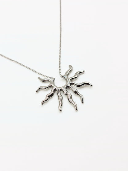 silver-sun-pendant-necklace-stud-earrings-matching-set-summer-stainless-steel-tarnish-free-jewellery-waterproof-ember-and-stone-1_f9a1e1c0-ce47-4bc7-9197-2eaf6c0348d1