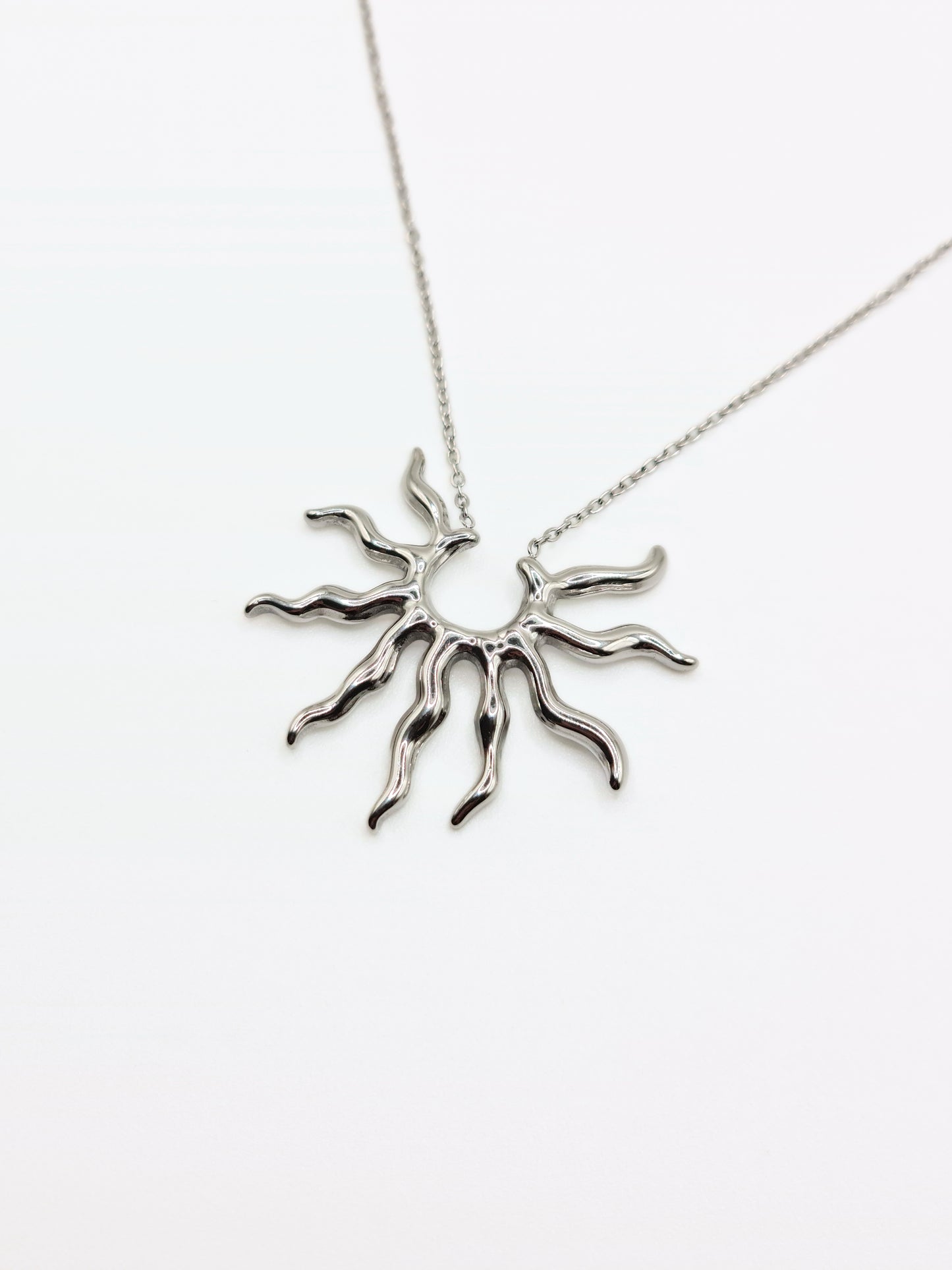 silver-sun-pendant-necklace-stud-earrings-matching-set-summer-stainless-steel-tarnish-free-jewellery-waterproof-ember-and-stone-1_f9a1e1c0-ce47-4bc7-9197-2eaf6c0348d1