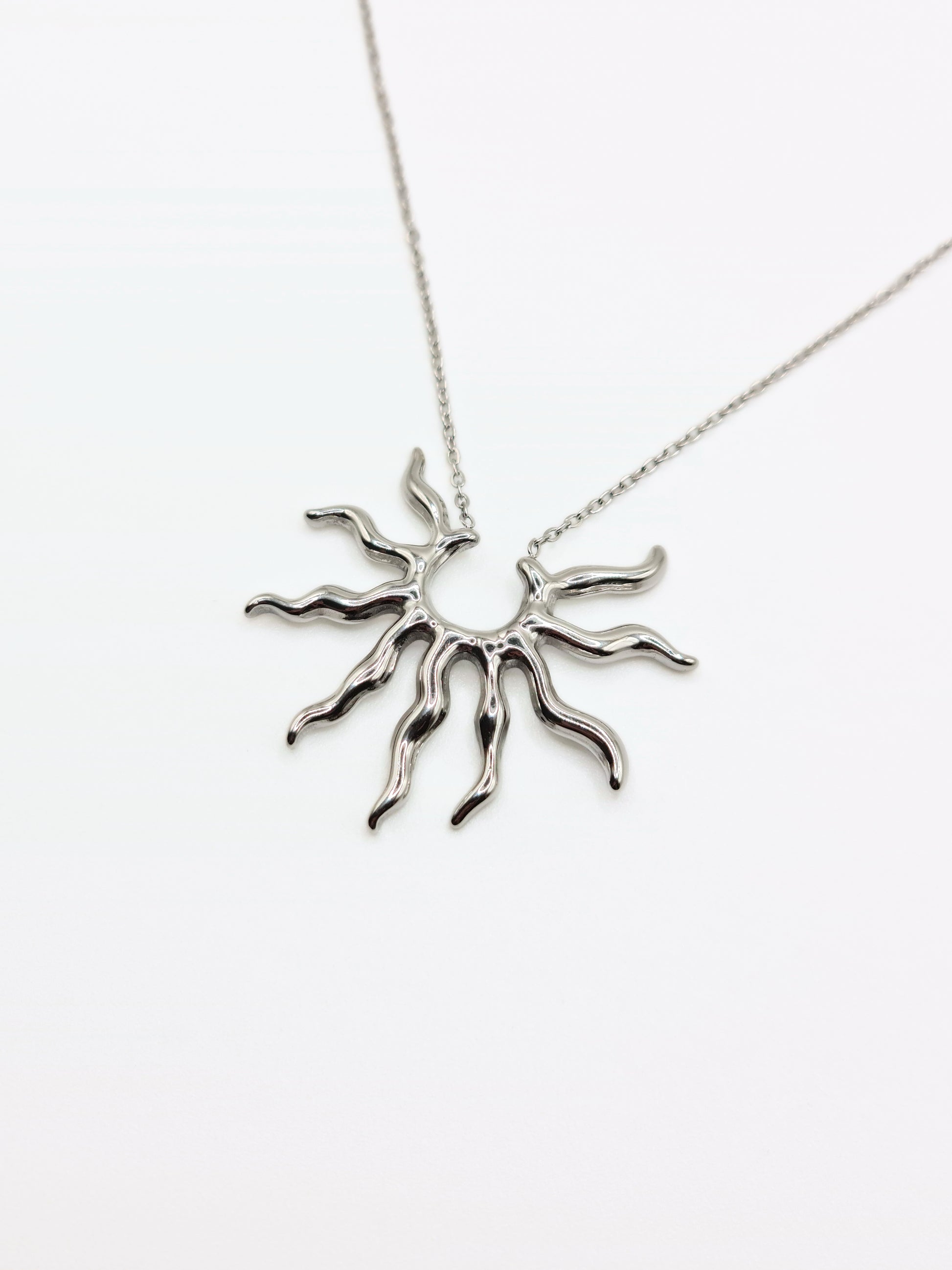 silver-sun-pendant-necklace-stud-earrings-matching-set-summer-stainless-steel-tarnish-free-jewellery-waterproof-ember-and-stone-1_f9a1e1c0-ce47-4bc7-9197-2eaf6c0348d1
